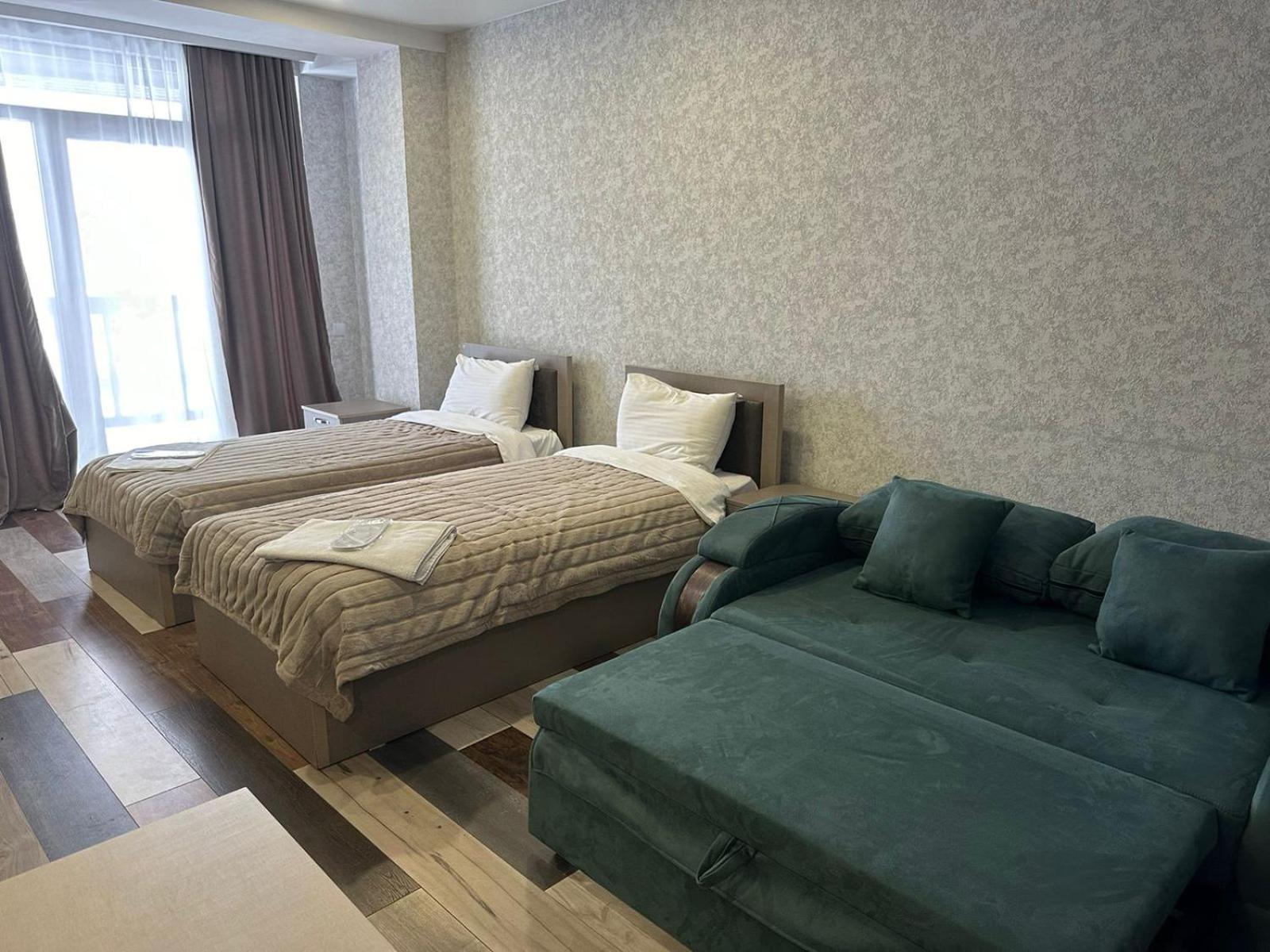 Hotel Qumli Гудаури Экстерьер фото