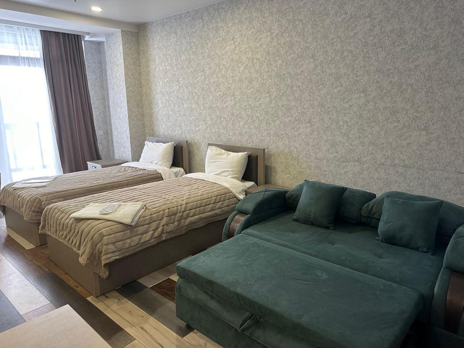 Hotel Qumli Гудаури Экстерьер фото
