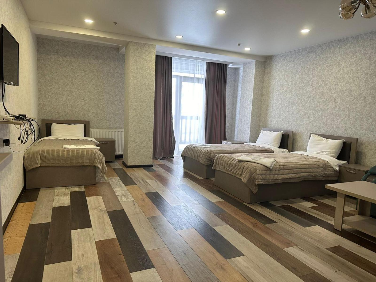 Hotel Qumli Гудаури Экстерьер фото