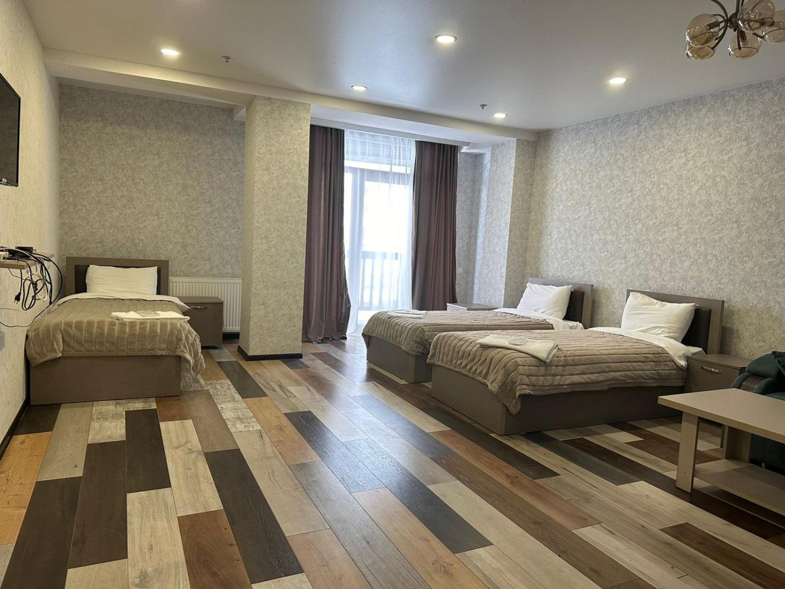 Hotel Qumli Гудаури Экстерьер фото