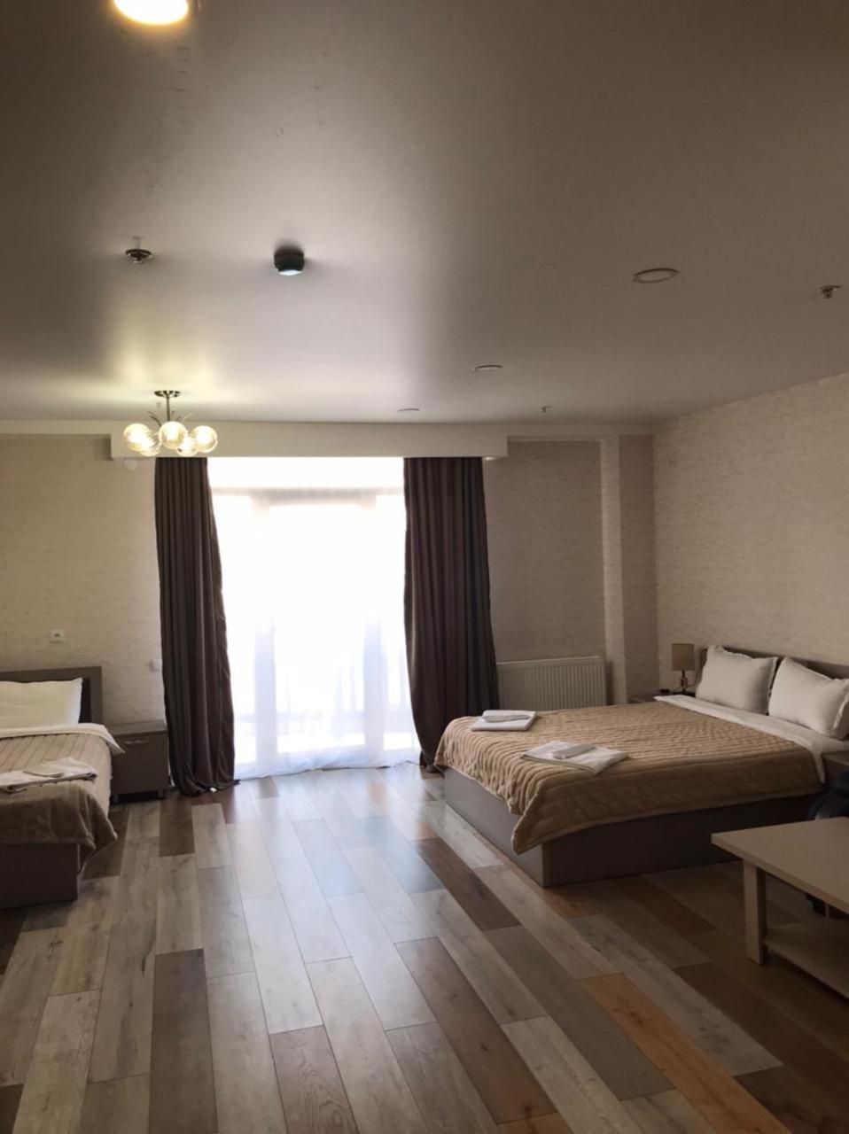 Hotel Qumli Гудаури Экстерьер фото
