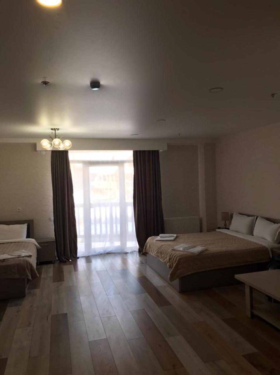 Hotel Qumli Гудаури Экстерьер фото